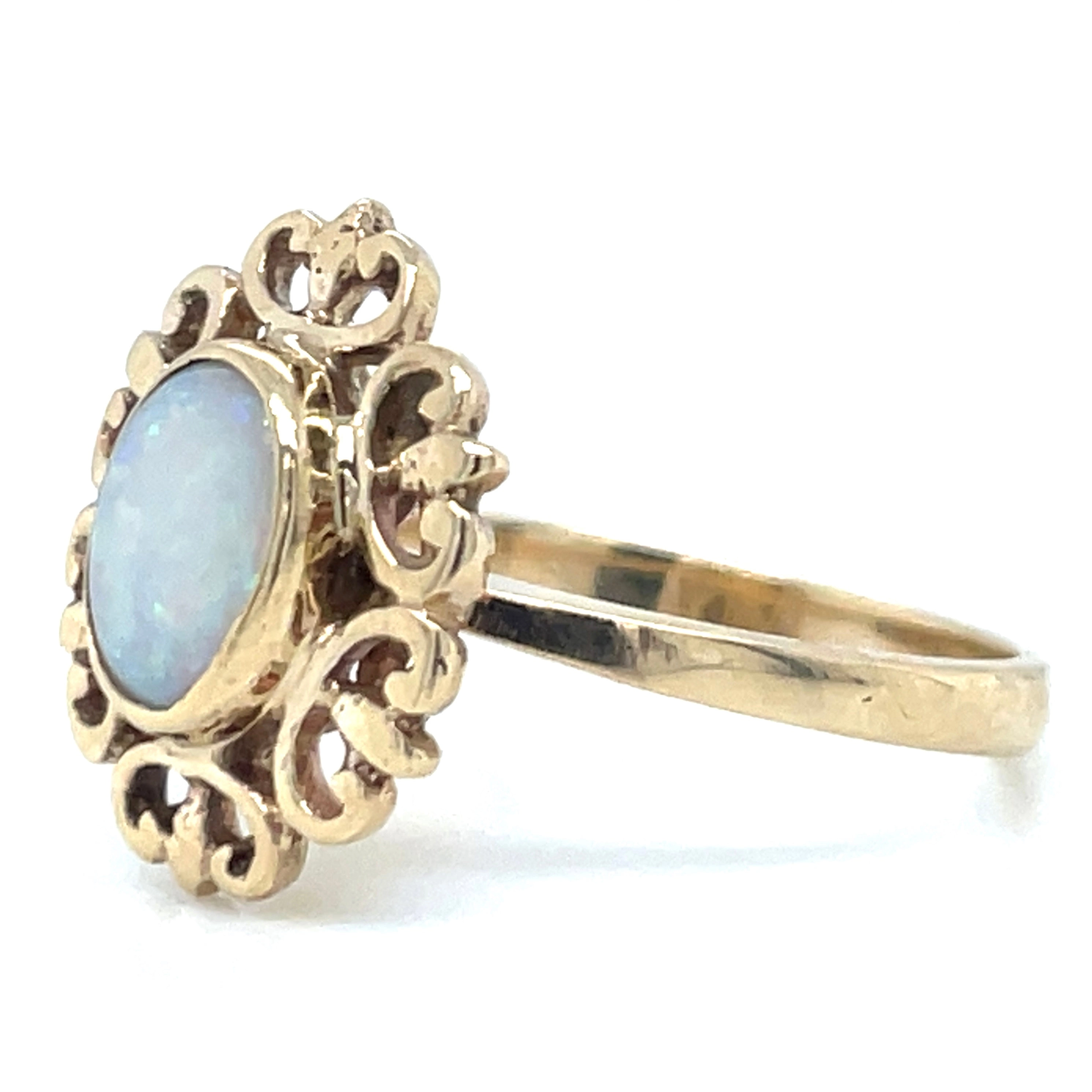 Vintage 9ct Yellow Gold Oval Opal With Detailed Halo Ring